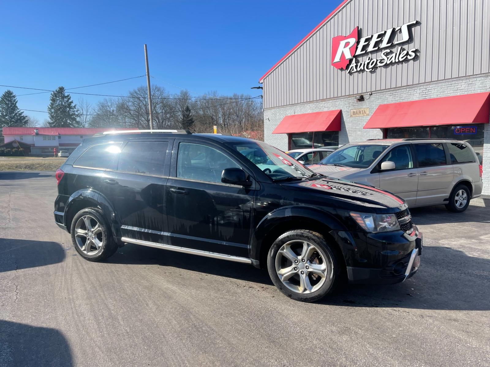 2016 Black /Black Dodge Journey Crossroad Plus AWD (3C4PDDGG9GT) with an 3.6L V6 DOHC 24V engine, 6A transmission, located at 547 E. Main St., Orwell, OH, 44076, (440) 437-5893, 41.535435, -80.847855 - This 2016 Dodge Journey Crossroad Plus AWD, powered by a robust 3.6L Pentastar V6 engine paired with a 6-speed automatic transmission, offers a mix of performance, comfort, and technological convenience. With features like the 8.4" Uconnect system, dusk-sensing headlights, a backup camera with senso - Photo #3